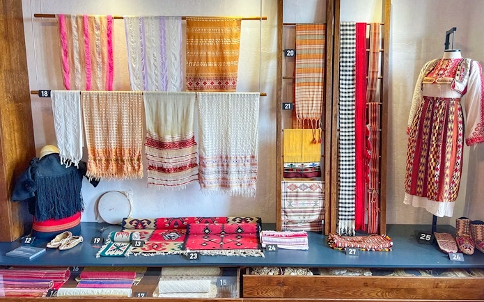 Traditional Albanian textiles and garments on display in the ethnographic museum at Kruja Castle, Albania.