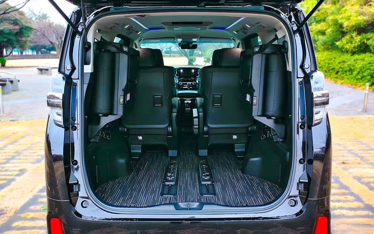 Interior view of a spacious private car for airport transfer.