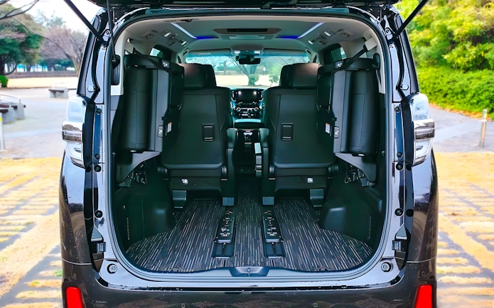 Interior view of a spacious private car for airport transfer.