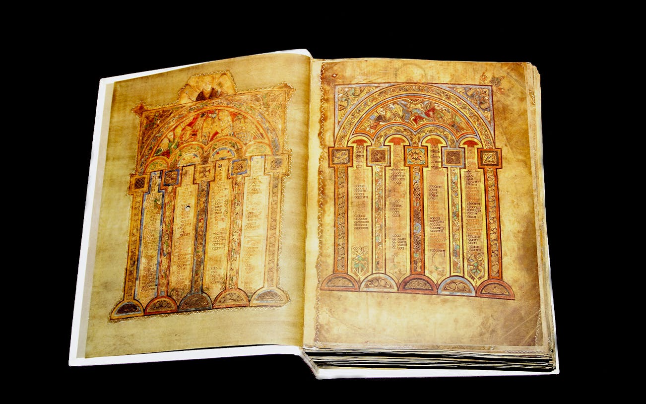Illuminated pages from the Book of Kells, featuring intricate Celtic designs.