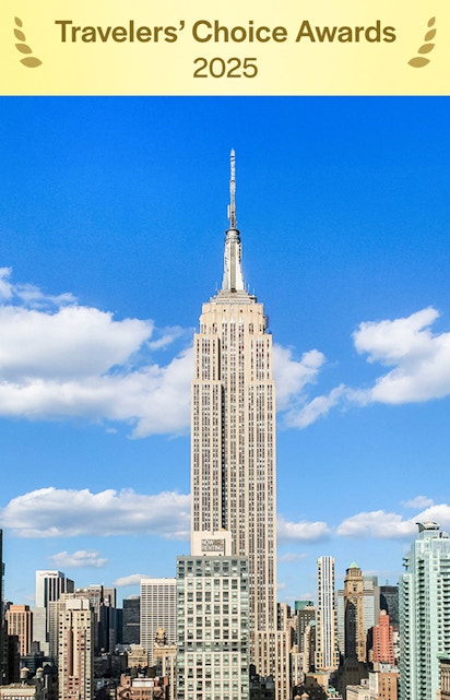 Empire State Building under a clear blue sky in Manhattan, NYC.
