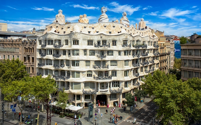 Casa Mila's unique stone facade and wavy balconies in Barcelona, Spain.