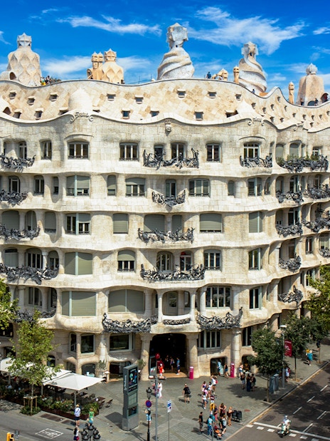 Casa Mila's unique stone facade and wavy balconies in Barcelona, Spain.