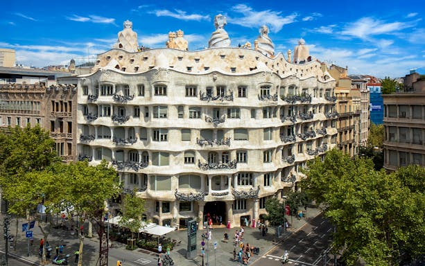 Casa Mila's unique stone facade and wavy balconies in Barcelona, Spain.