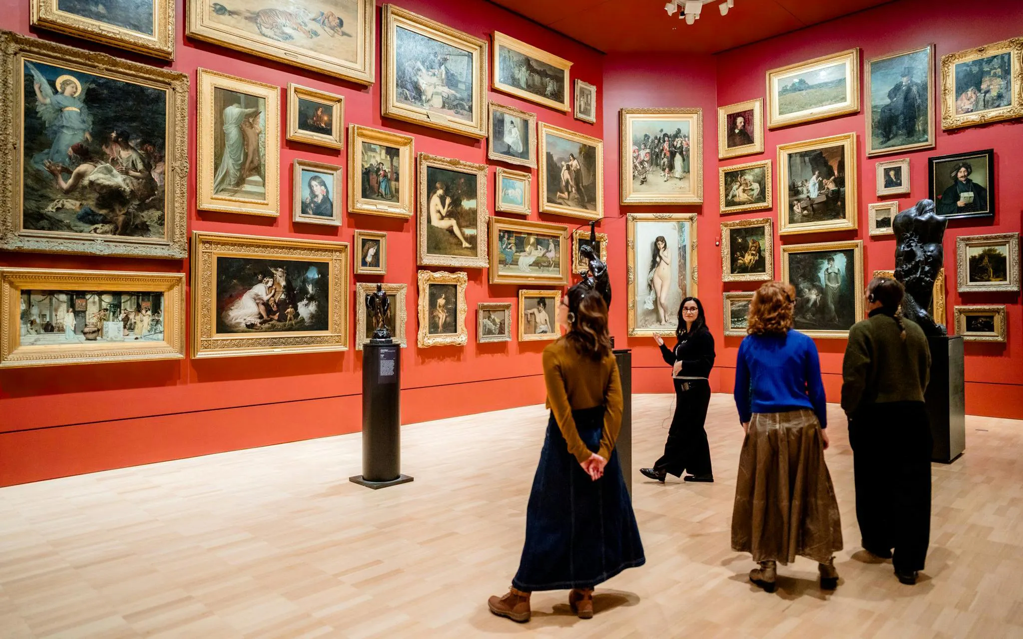 Visitors exploring art gallery at National Gallery of Victoria on Best of NGV Experiences Tour.