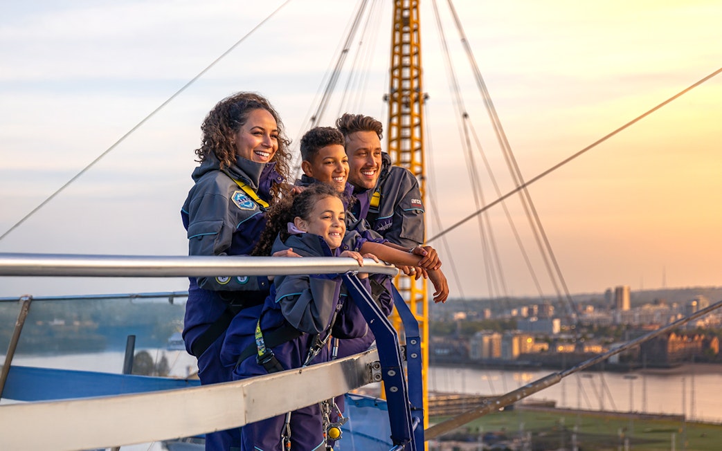 Guests enjoying the view from the O2 at sunset in London.