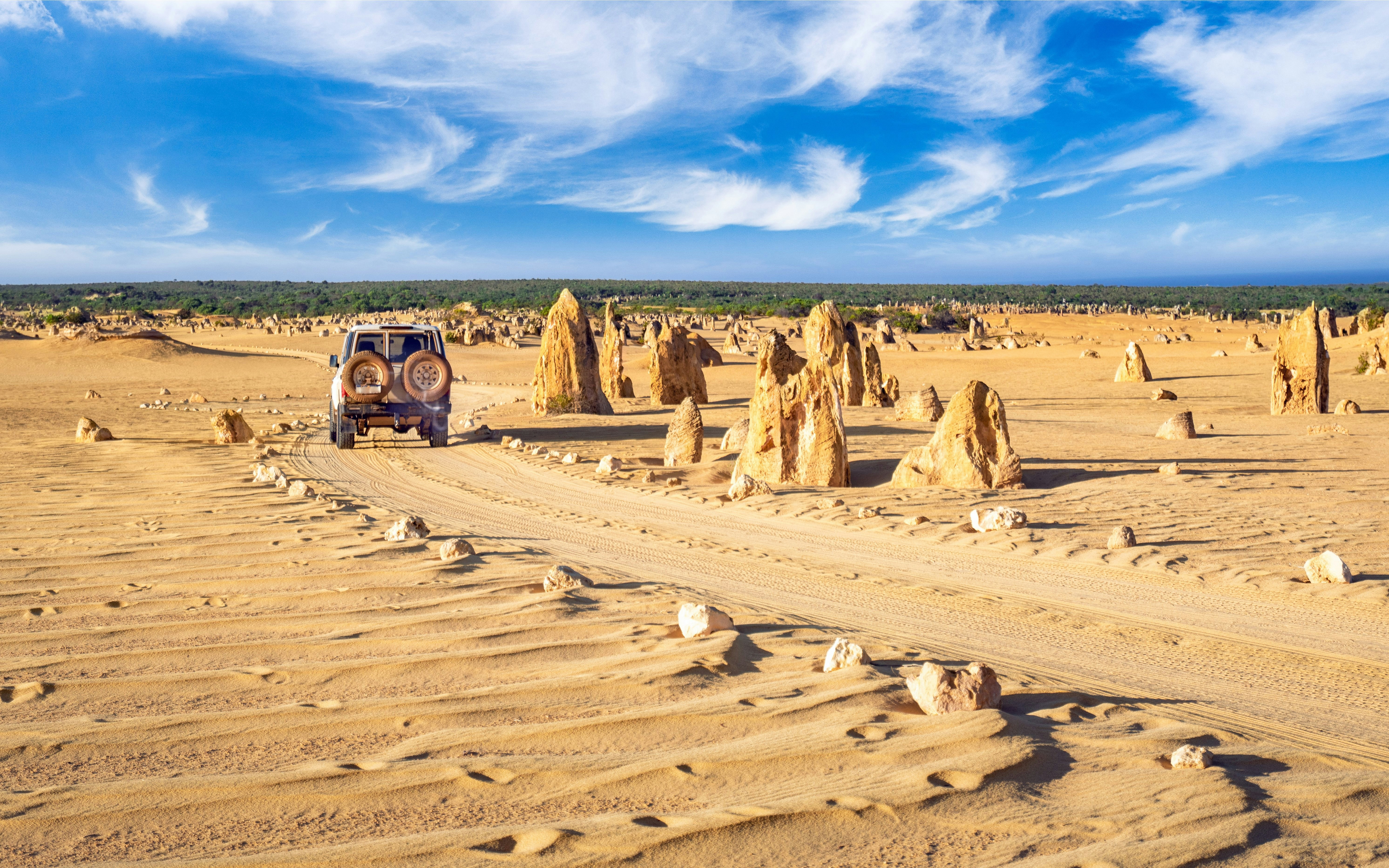 4WD driving through the rocky route of Nambung National Park pinnacles.