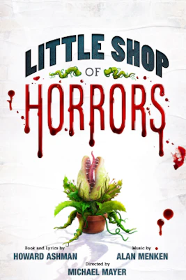 Audrey II plant puppet on stage during Little Shop Of Horrors performance.