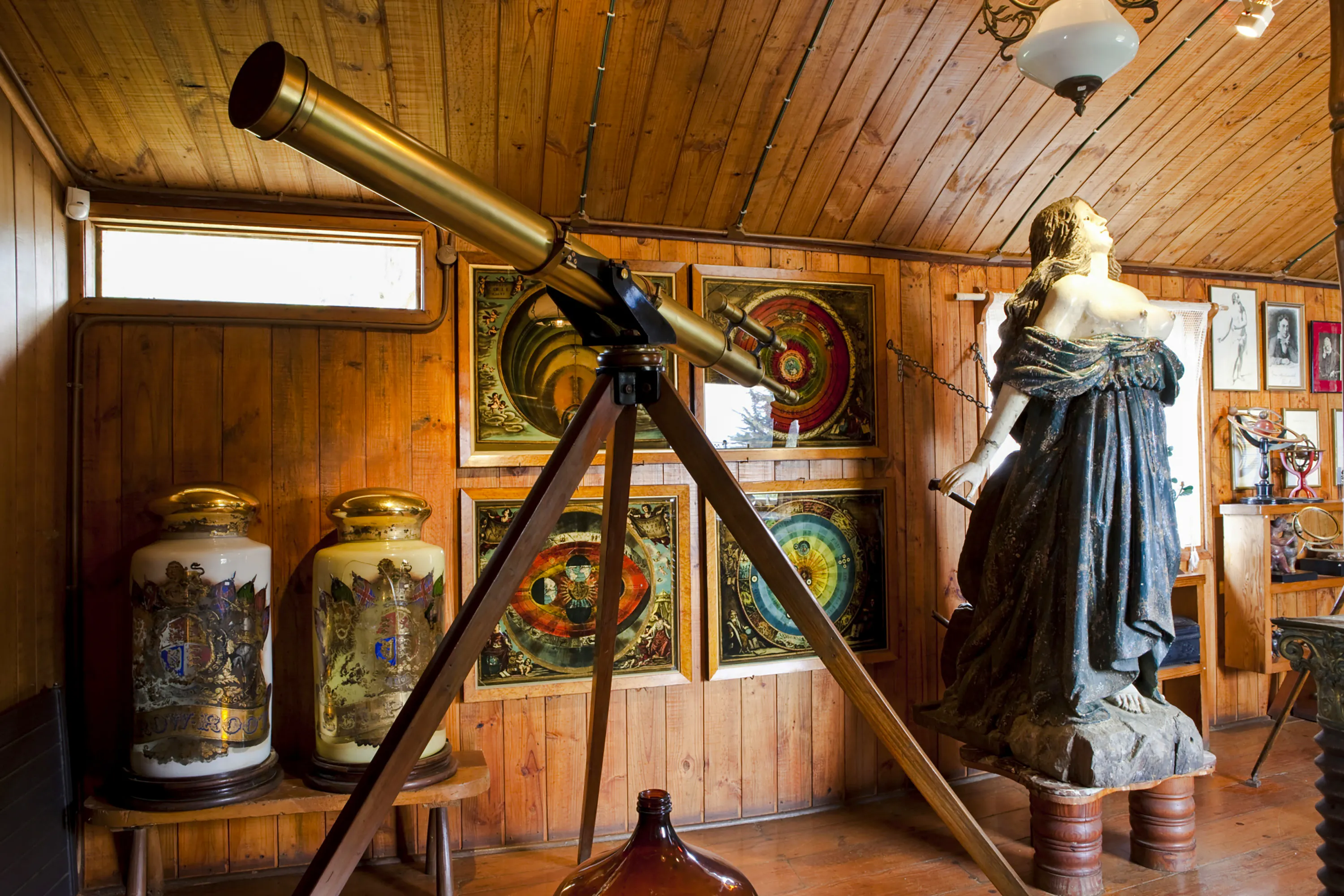 Telescope and statue inside Pablo Neruda's Museum, Isla Negra, Santiago.
