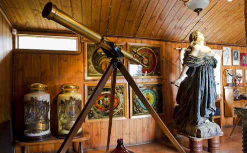 Telescope and statue inside Pablo Neruda's Museum, Isla Negra, Santiago.