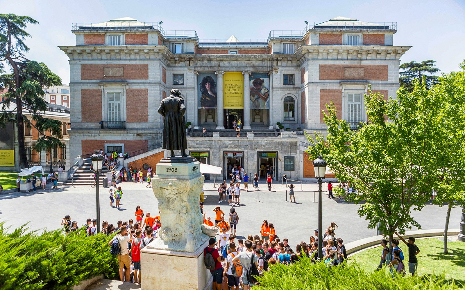 Tourists exploring the famous Prado Museum in Madrid, Spain, showcasing unique art collections