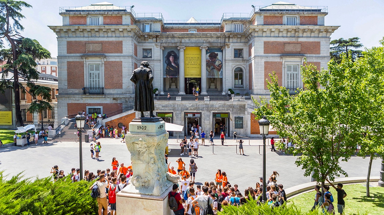 Tourists exploring the famous Prado Museum in Madrid, Spain, showcasing unique art collections