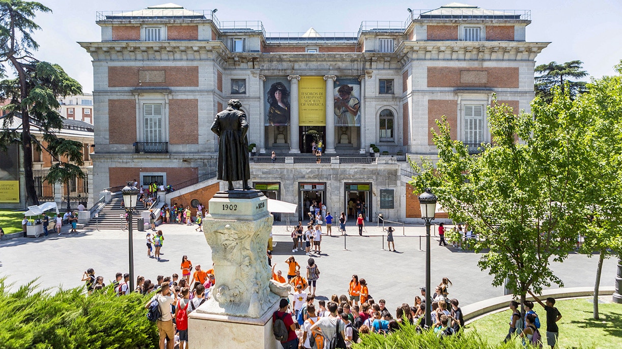 Tourists exploring the famous Prado Museum in Madrid, Spain, showcasing unique art collections