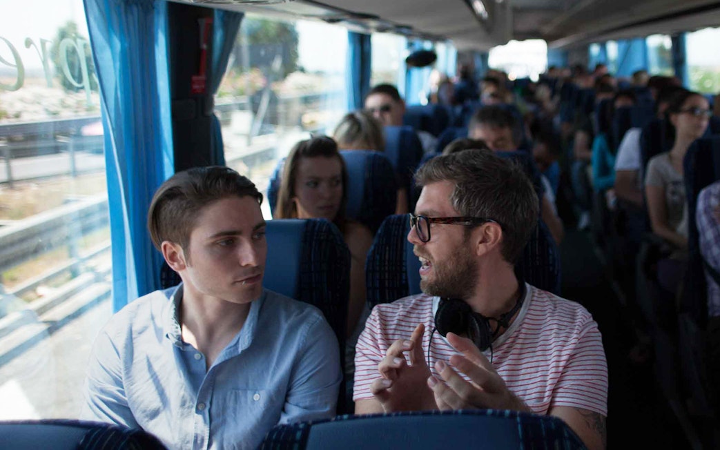 Passengers seated on a Terravision bus traveling between Ciampino Airport and Rome city center.