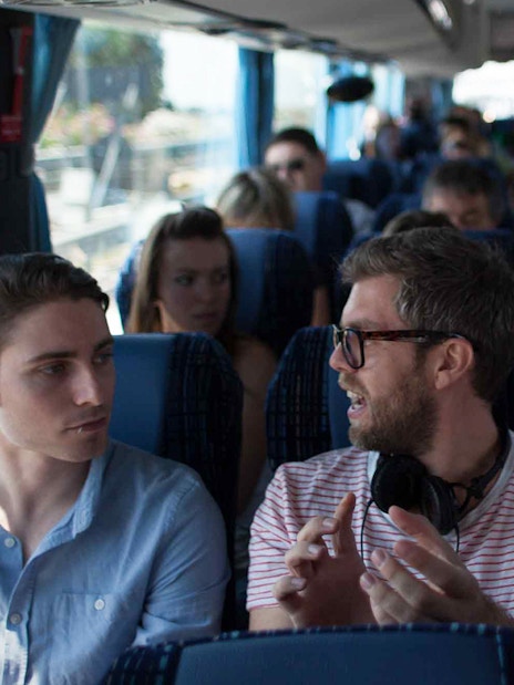 Passengers seated on a Terravision bus traveling between Ciampino Airport and Rome city center.