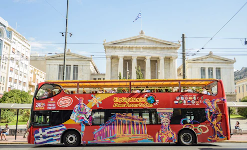 https://cdn-imgix.headout.com/media/images/dd288b8b530e8c36ef6f491b59da124f-19793-athens-athens---piraeus-hop-on-hop-off-tour-05.jpg?auto=format&crop=faces&fit=crop&h=302.4&q=90&w=495