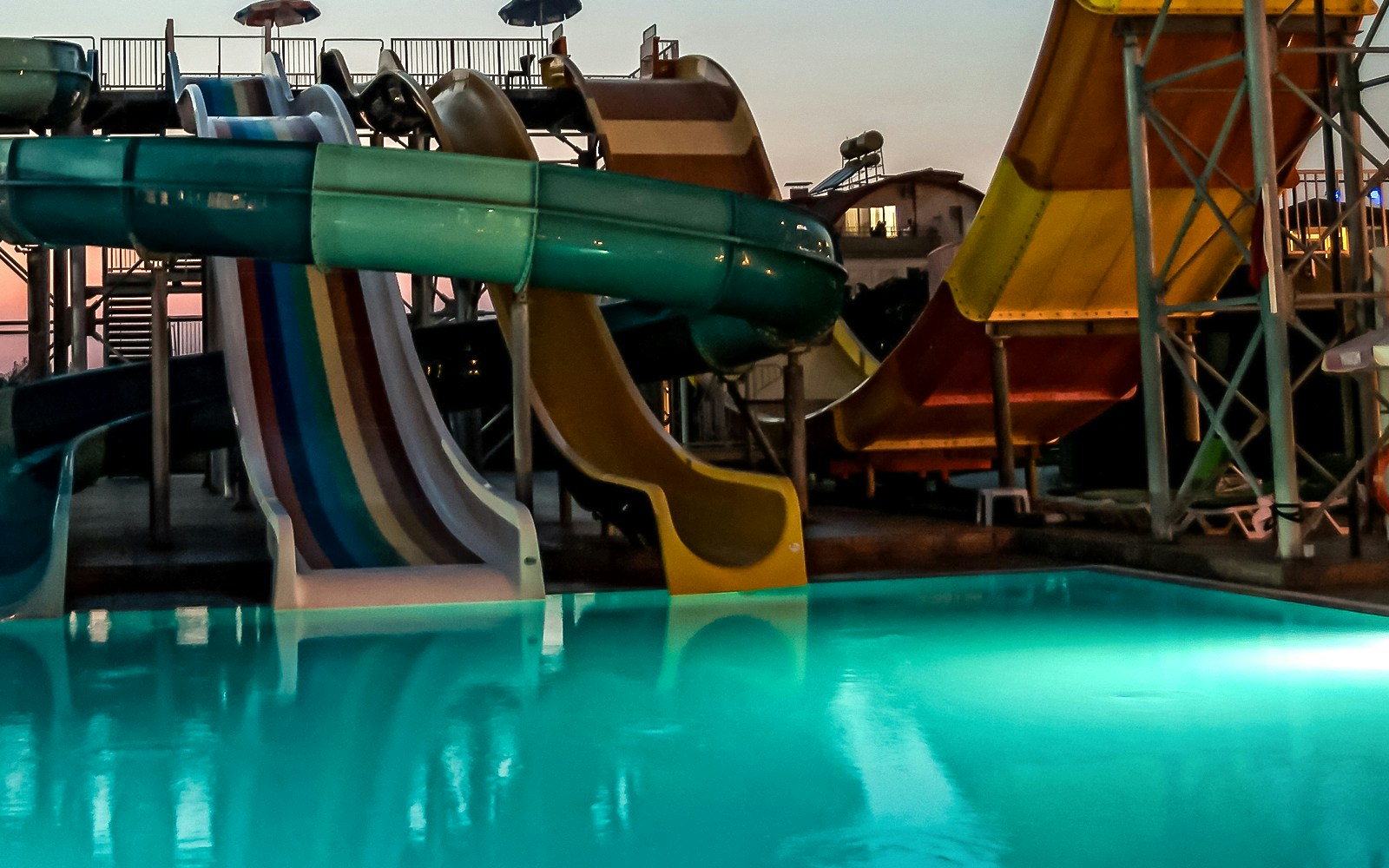 view of water park slides at night