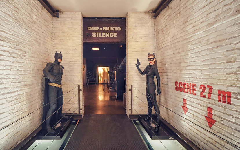 Batman and Catwoman statues at Le Grand Rex cinema tour entrance, Paris.