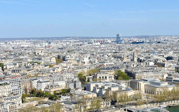 Paris cityscape view from the Eiffel Tower, featuring the Arc de Triomphe, Paris, France.