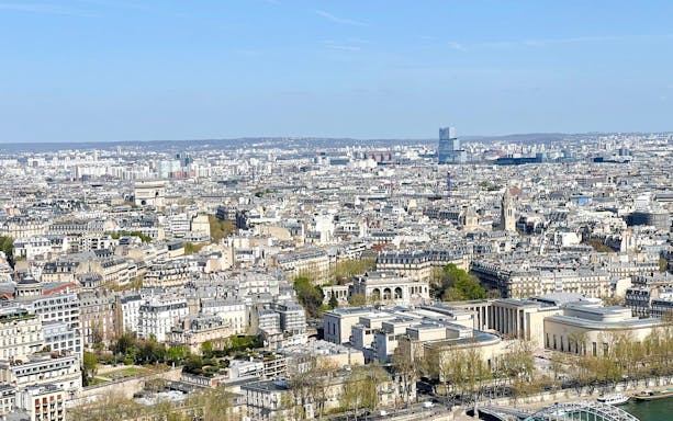 Paris cityscape view from the Eiffel Tower, featuring the Arc de Triomphe, Paris, France.