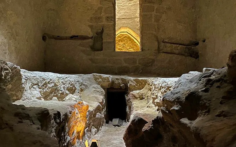 Underground stone hamam interior with arched window in Baku, Azerbaijan.
