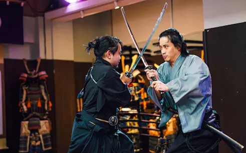 Samurai swordplay demonstration in Tokyo dojo.