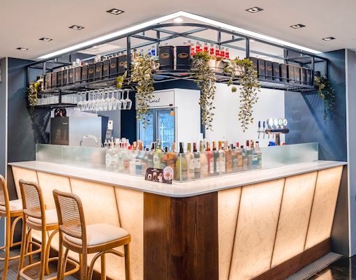 Bar area in Coral Finest Business Class Lounge, Concourse D1, Bangkok airport, Thailand.