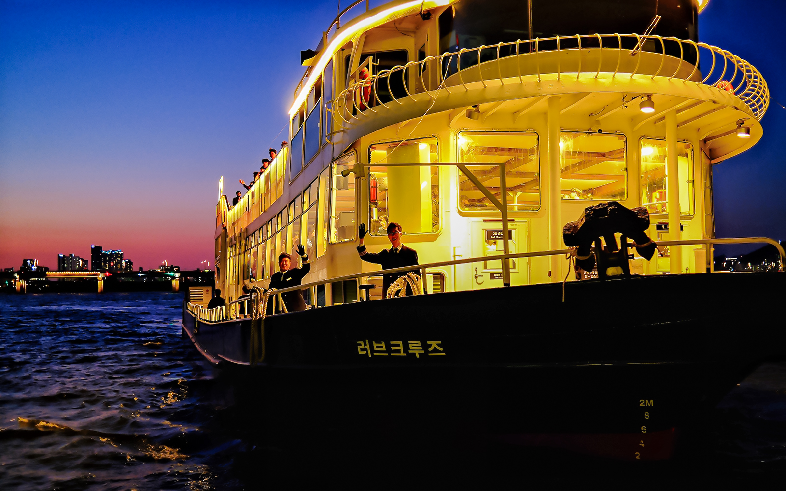 Sunset cruise on Eland Cruise ship with city skyline, Seoul.