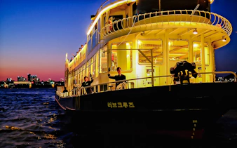 Sunset cruise on Eland Cruise ship with city skyline, Seoul.