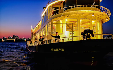Sunset cruise on Eland Cruise ship with city skyline, Seoul.