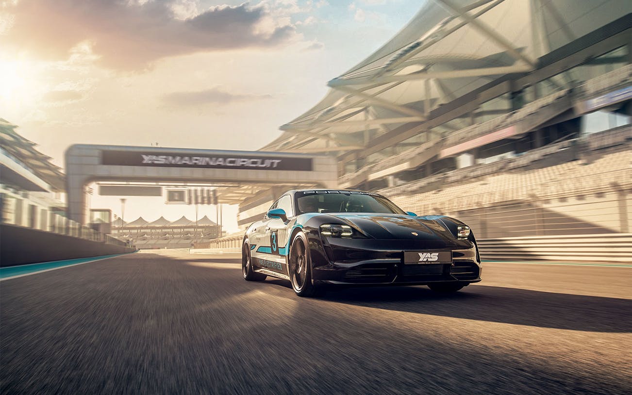 Porsche Taycan Turbo on track at Yas Marina Circuit, Abu Dhabi.