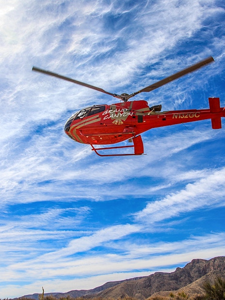 Helicopter flying over Horseshoe Bend during a scenic tour, highlighting the natural landscape.
