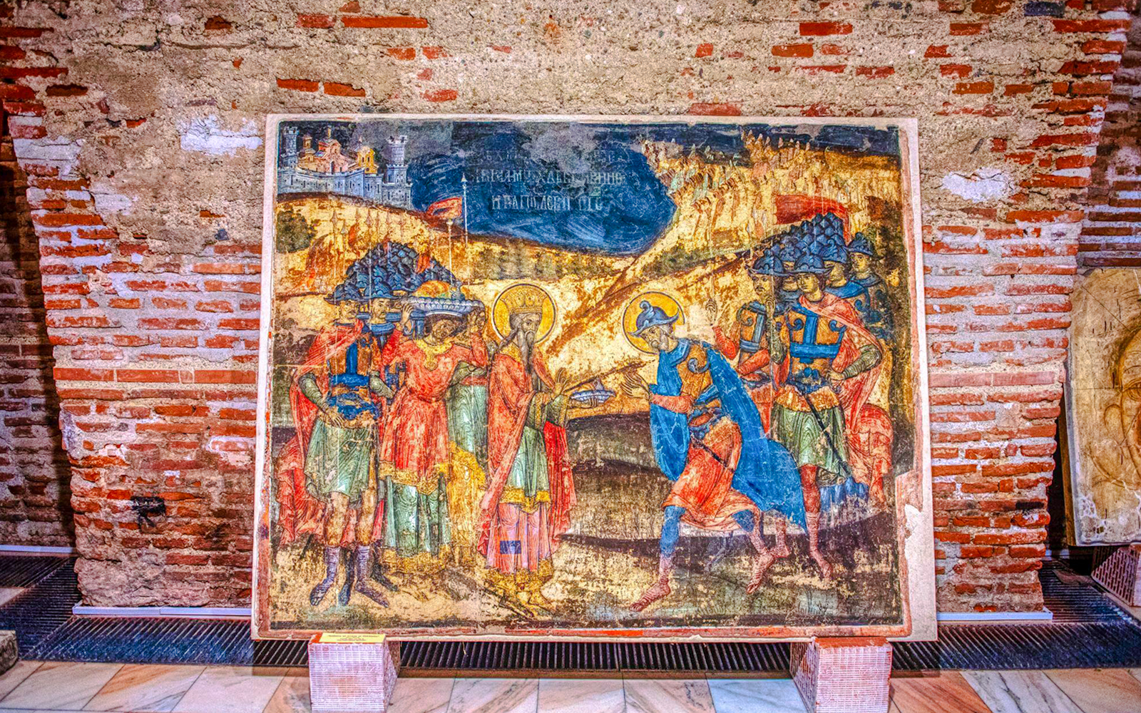 Fresco inside Mogosoaia Palace, Romania depicting historical figures and scenes.