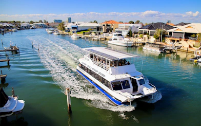 Tourists on a canal cruise boat in Mandurah, Australia.