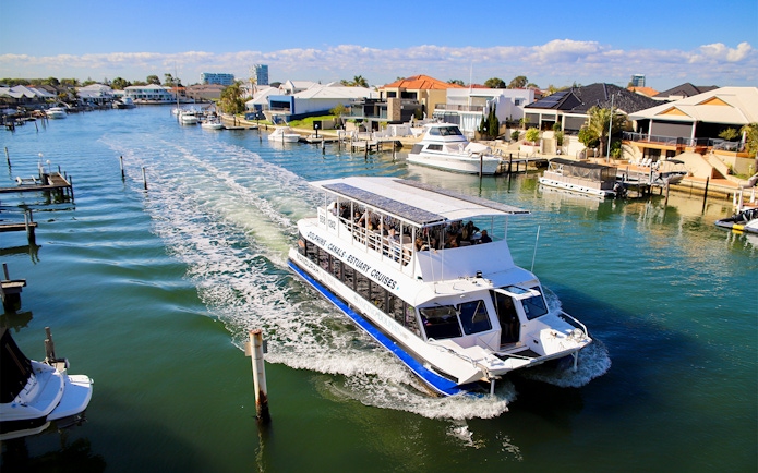 Tourists on a canal cruise boat in Mandurah, Australia.