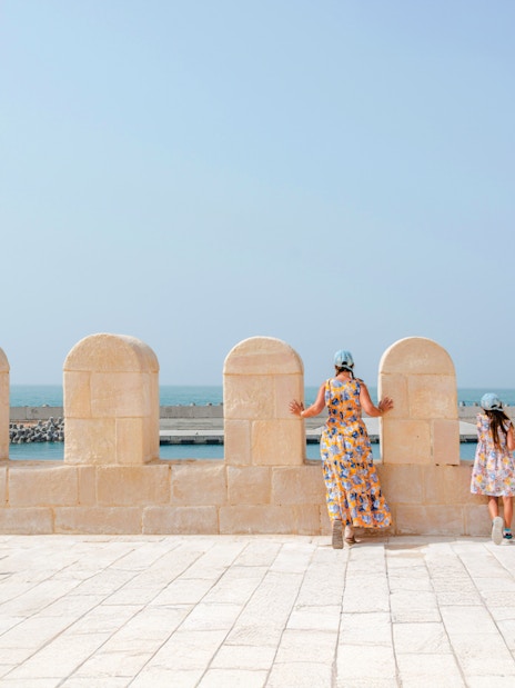 Mother and daughter view the sea from Qaitbay Citadel, Alexandria.