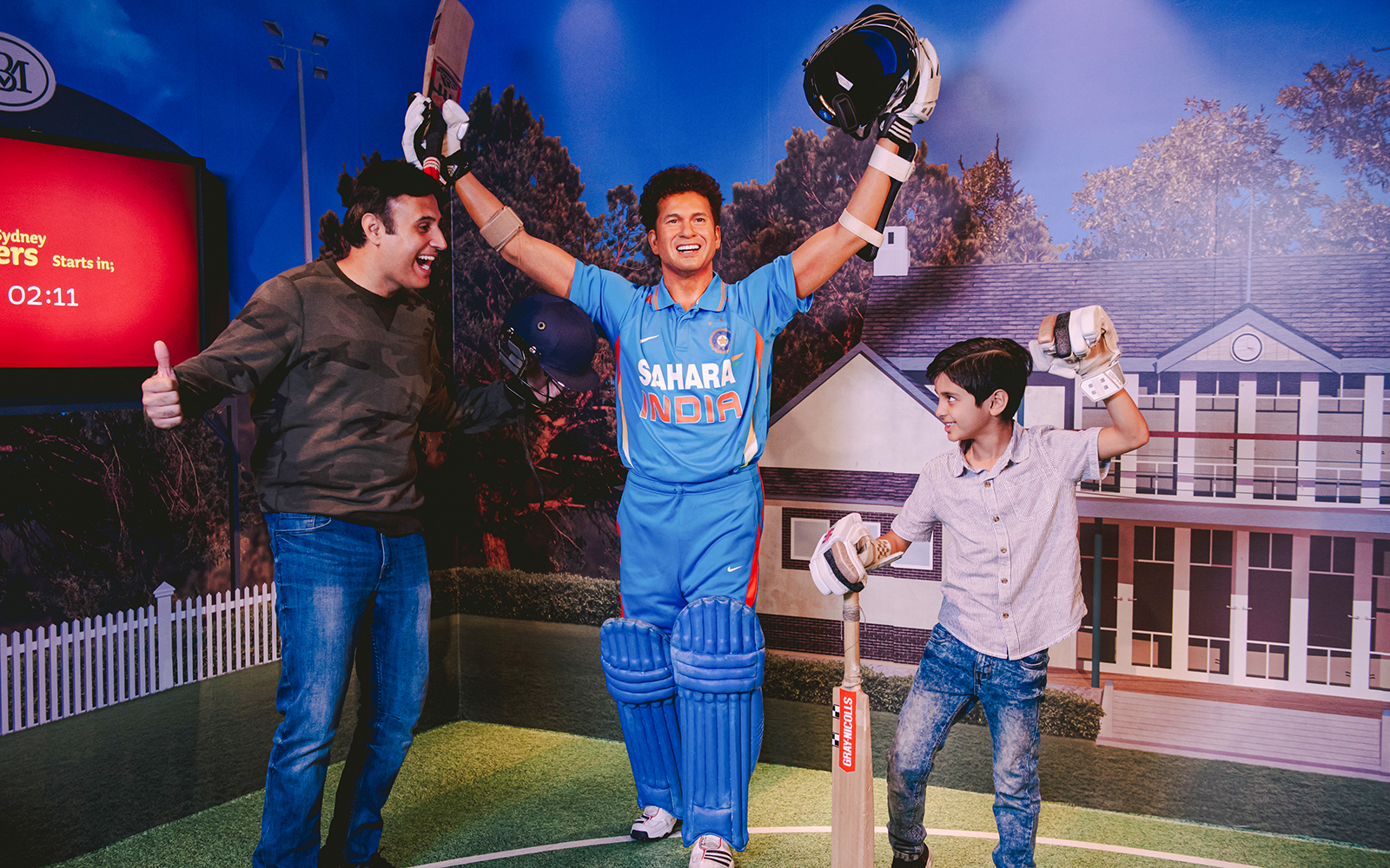 Sachin Tendulkar wax figure with fans at Madame Tussauds Sydney.