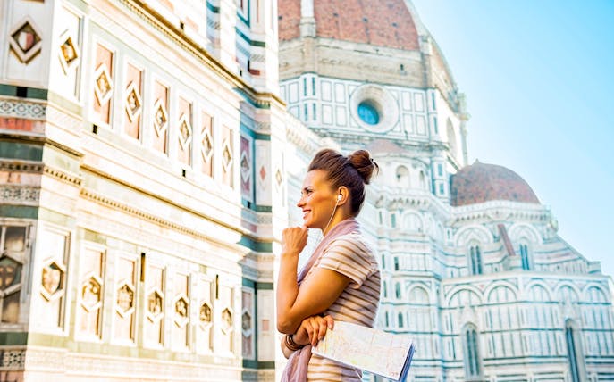 Visitor with audioguide at Florence's Cathedral and Piazza Duomo.