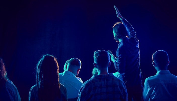 audience at a film screening inside a theatre