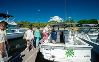 Tourists boarding a boat for a Rio de Janeiro tour.