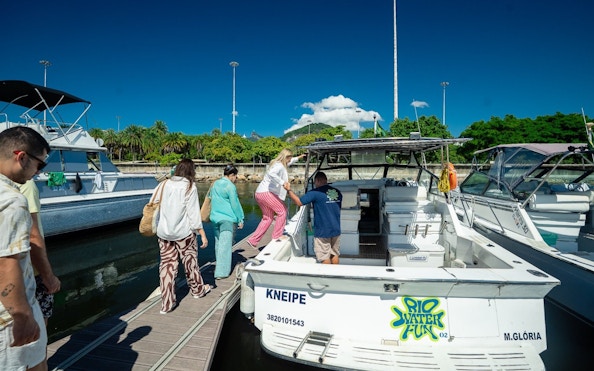 Tourists boarding a boat for a Rio de Janeiro tour.