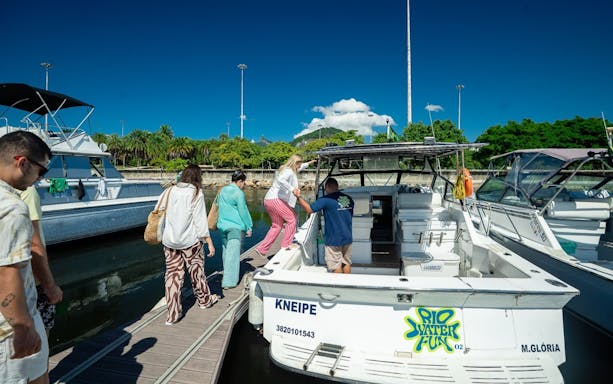 Tourists boarding a boat for a Rio de Janeiro tour.