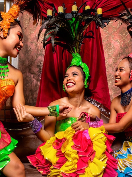 Performers in colorful costumes at Sunway Lagoon Night Park.