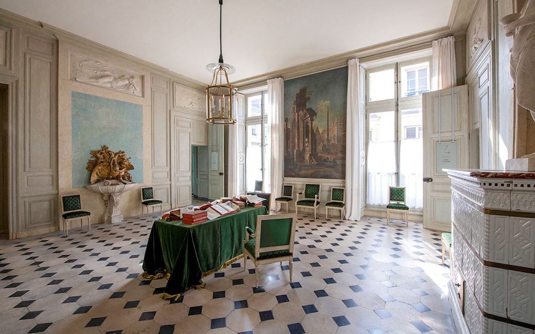Hôtel de la Marine interior with ornate decor and historical artwork in Paris.