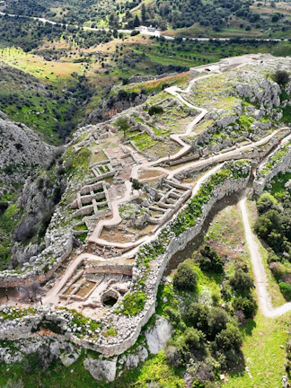 Aerial view of the ancient citadel of Mycenae with ruins and pathways, Argolida, Greece.