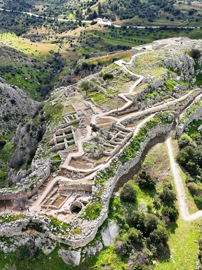 Aerial view of the ancient citadel of Mycenae with ruins and pathways, Argolida, Greece.