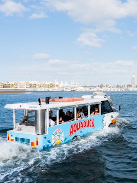 Aquaduck tour boat cruising on Sunshine Coast water with passengers onboard.