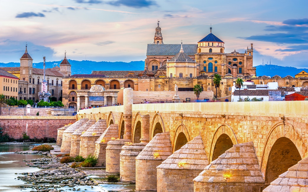 Roman Bridge and Mosque-Cathedral in Cordoba, Spain skyline.