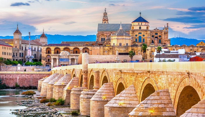 Roman Bridge and Mosque-Cathedral in Cordoba, Spain skyline.