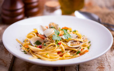 Pasta with clams and herbs, part of Bruny Island lighthouse tour food tasting, Hobart departure.